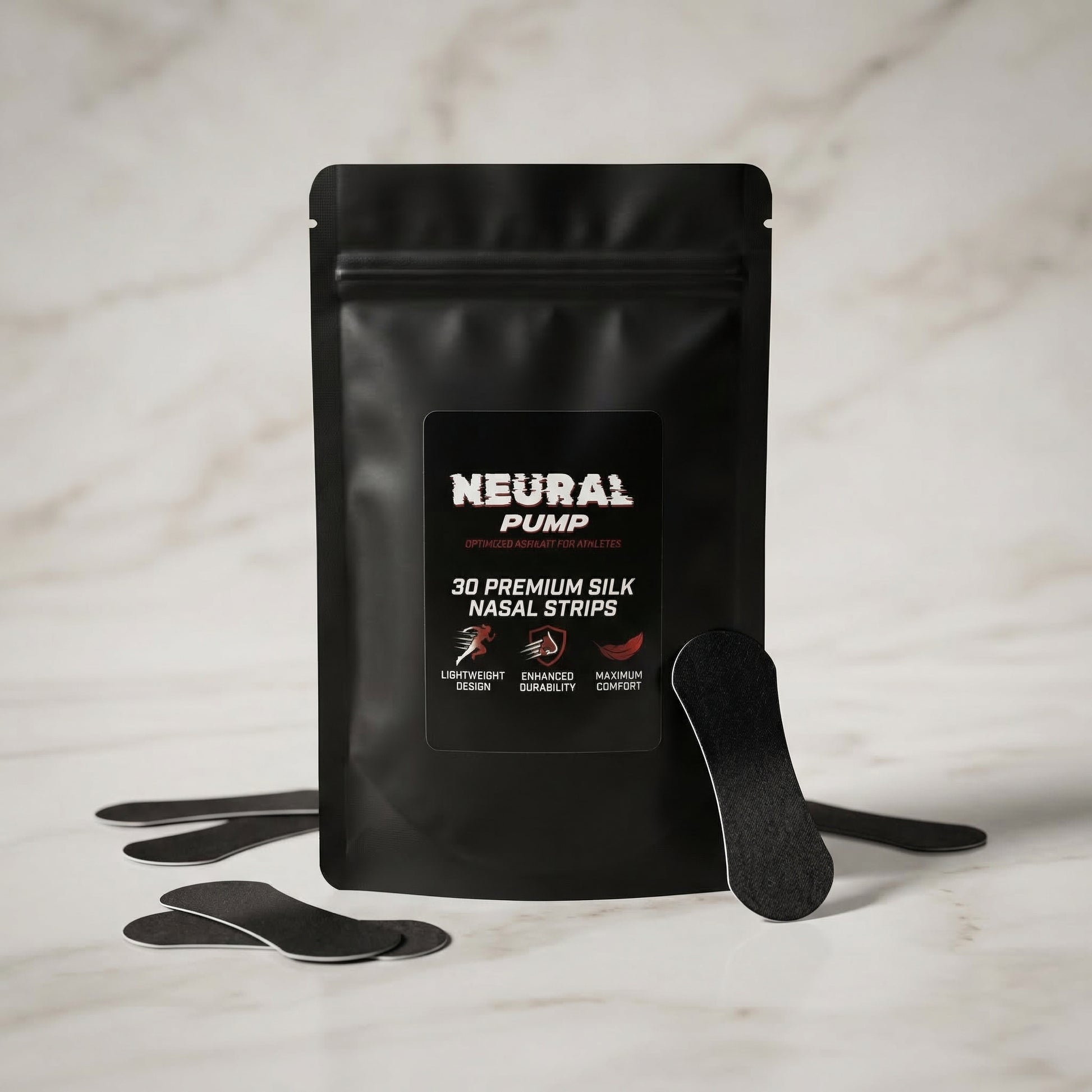 Black package of Neural Pump nasal strips on a marble surface