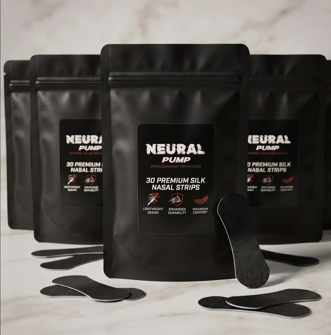 Black packages of Neural Pump silk nasal strips on a light background
